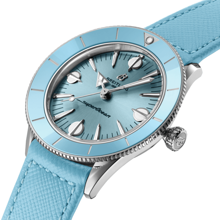 Breitling’s colorful tribute to the original SuperOcean, and the very essence of style at sea.
The Superocean Heritage ’57 Pastel Paradise Capsule Collection reuses several design elements from the original 1957 SuperOcean such as the concave ceramic bezel, oversized indexes and arrow-shaped hour hand.
But what started as a neat 1950s divers’ watch has evolved into a sleek and fresh watch with a bit of sass and a lot of versatility. Think playsuits, pink flamingos, and headbands setting off perfectly flipped hair. Imagine a carefree and confident lady enjoying a seaside resort, sporting big sunglasses and swinging a straw handbag.
Available in a tempting range of summer shades, the Superocean Heritage ’57 Pastel Paradise Capsule Collection is all about color, proportion and of course substance. It features a 38mm stainless steel case with matching tone-on-tone dials, ceramic bezels and Saffiano calfskin straps. Those who want a custom color combination will love the quick-exchange system for swapping out the straps, which also come in additional colors. The Superocean Heritage ’57 Pastel Paradise is powered by the Breitling Caliber 10, a COSC-certified chronometer.