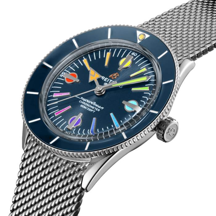 The Superocean Heritage ’57 Capsule collection pays tribute to the original 1957 SuperOcean and the cool, laid-back surfing lifestyle of the 1960s. This colorful variation comes in a limited edition of 1000 pieces.
The 42 mm stainless-steel case features two signature elements of the original SuperOcean: a concave bidirectional ceramic bezel and a dial featuring oversized indices. Paired with a mesh bracelet or a gold brown calfskin leather strap that fits both a stainless-steel pin or folding buckle, this colorful Superocean Heritage ‘57 is powered by the Breitling Caliber 10, a COSC-certified chronometer.