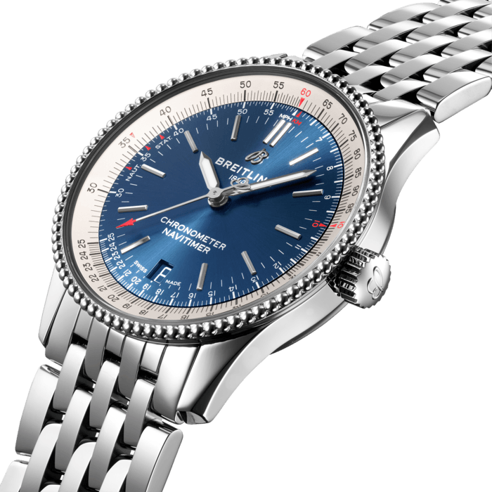 Refined and elegant, the Navitimer Automatic 38 combines the historic appeal of a true icon with the sophistication of a contemporary timepiece.
Available in a variety of materials including stainless steel and 18k red gold, the 38 mm case features a beaded bezel and a range of elegant black, blue or silver dials. Offered either with a matching bracelet, or a black, blue or gold alligator strap that fits both a stainless-steel pin or folding buckle, the Navitimer Automatic 38 is powered by the Breitling Caliber 17, a COSC-certified chronometer.