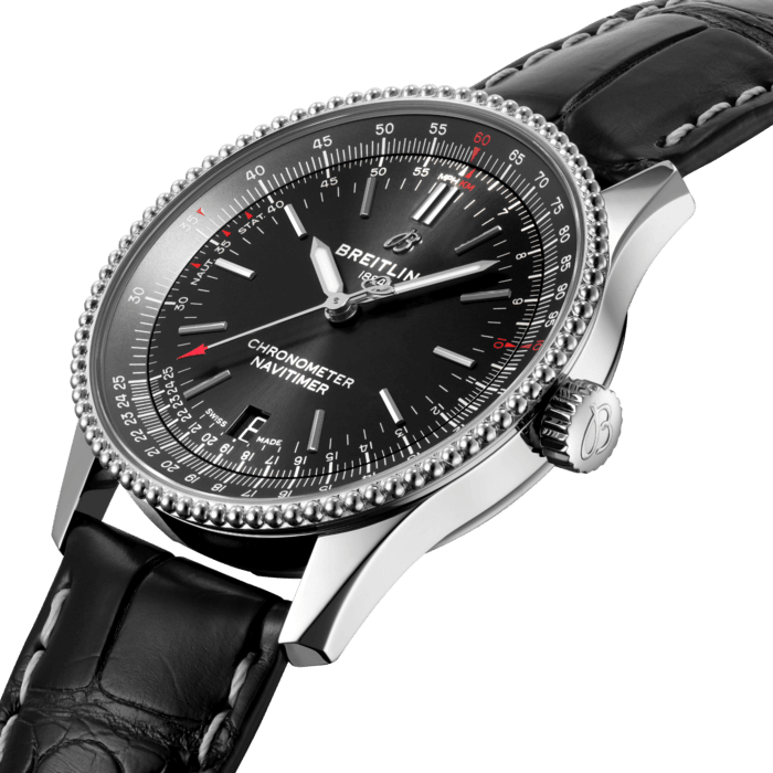 Refined and elegant, the Navitimer Automatic 38 combines the historic appeal of a true icon with the sophistication of a contemporary timepiece.
Available in a variety of materials including stainless steel and 18k red gold, the 38 mm case features a beaded bezel and a range of elegant black, blue or silver dials. Offered either with a matching bracelet, or a black, blue or gold alligator strap that fits both a stainless-steel pin or folding buckle, the Navitimer Automatic 38 is powered by the Breitling Caliber 17, a COSC-certified chronometer.