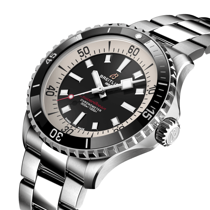 Performance and style for all your water-based pursuits.
In the 1960s, the new sport of scuba diving was all the rage. For divers, timing was everything, and Breitling set out to give them the most clear-cut dive watch possible by eliminating any feature that didn’t support their lifesaving needs underwater. This pared-down watch was named the Slow Motion. What remained were clean lines, chunky luminescent indexes, squared-off hands and a high-contrast dial ring, all aimed at maximum legibility. Practical, yes. But what people really fell in love with was the look.
The new Superocean retraces the Slow Motion's celebrated design codes, while adding modern features, like a ceramic-inlayed bezel and brightly colored dials. Broad hands and indexes in luminescent Super-LumiNova® allow for easy readability underwater. The watch is water resistant to 300 m (1000 ft), as well as being shock-, sand- and saltwater-resistant. The bronze version uses a special alloy that has excellent resistance to corrosion, yet will still develop a subtle patina over time that makes the watch even more unique. The two strap options (rubber and metal bracelet) have a folding clasp that allows for micro-adjustments of up to 15 mm for easy wear over rashies and wetsuits. Its scratch-proof ceramic inlayed bezel will never wear or fade. For safety, the bezel is uni-directional on most sizes and bi-directional with a patented lock on the 46 mm.
Best of all, this is no longer strictly a dive watch—surf with it, swim with it, hit the beach bar with it, then wear it out to dinner. The Superocean perfectly balances the nostalgia of its heritage with a fresh new look.