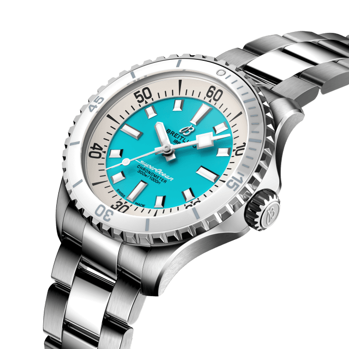 Performance and style for all your water-based pursuits.
In the 1960s, the new sport of scuba diving was all the rage. For divers, timing was everything, and Breitling set out to give them the most clear-cut dive watch possible by eliminating any feature that didn’t support their lifesaving needs underwater. This pared-down watch was named the Slow Motion. What remained were clean lines, chunky luminescent indexes, squared-off hands and a high-contrast dial ring, all aimed at maximum legibility. Practical, yes. But what people really fell in love with was the look.
The new Superocean retraces the Slow Motion's celebrated design codes, while adding modern features, like a ceramic-inlayed bezel and brightly colored dials. Broad hands and indexes in luminescent Super-LumiNova® allow for easy readability underwater. The watch is water resistant to 300 m (1000 ft), as well as being shock-, sand- and saltwater-resistant. The bronze version uses a special alloy that has excellent resistance to corrosion, yet will still develop a subtle patina over time that makes the watch even more unique. The two strap options (rubber and metal bracelet) have a folding clasp that allows for micro-adjustments of up to 15 mm for easy wear over rashies and wetsuits. Its scratch-proof ceramic inlayed bezel will never wear or fade. For safety, the bezel is uni-directional on most sizes and bi-directional with a patented lock on the 46 mm.
Best of all, this is no longer strictly a dive watch—surf with it, swim with it, hit the beach bar with it, then wear it out to dinner. The Superocean perfectly balances the nostalgia of its heritage with a fresh new look.