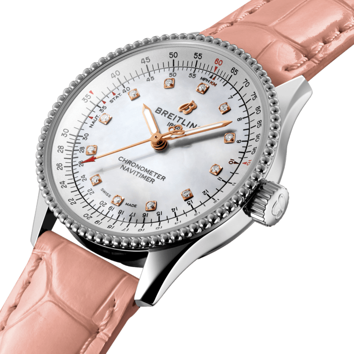 Refined and elegant, the Navitimer Automatic 35 combines the historic appeal of a true icon with the sophistication of a contemporary timepiece.
Available in a variety of materials including stainless steel and 18k red gold, the 35 mm case features a beaded bezel and a range of elegant dial colors, as well as diamond-set white mother of pearl. Offered either with a matching bracelet or alligator strap that fits both a stainless steel pin or folding buckle, the Navitimer Automatic 35 is powered by the Breitling Caliber 17, a COSC-certified chronometer.