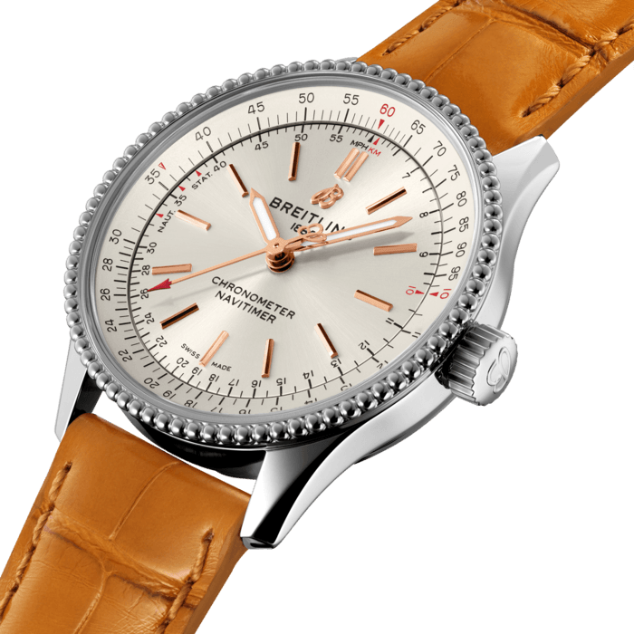 Refined and elegant, the Navitimer Automatic 35 combines the historic appeal of a true icon with the sophistication of a contemporary timepiece.
Available in a variety of materials including stainless steel and 18k red gold, the 35 mm case features a beaded bezel and a range of elegant dial colors, as well as diamond-set white mother of pearl. Offered either with a matching bracelet or alligator strap that fits both a stainless steel pin or folding buckle, the Navitimer Automatic 35 is powered by the Breitling Caliber 17, a COSC-certified chronometer.