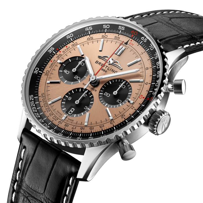 Breitling’s iconic pilot’s chronograph – for the journey.
In 1952, Willy Breitling developed a wrist-worn chronograph with a circular slide rule that would allow pilots to perform all necessary flight calculations. Two years later, the Aircraft Owners and Pilots Association (AOPA) announced the design as its official timepiece. The “navigation timer” – or Navitimer – was born.
The AOPA was (and remains) the largest pilots’ club in the world, counting nearly every US aviator among its ranks. As the defacto pilot’s watch throughout the glory days of civil aviation, the Navitimer was worn by airline captains and aircraft enthusiasts. It even made its way into space on the wrist of astronaut Scott Carpenter in 1962. And it wasn’t only pilots drawn to the watch’s irrepressible aesthetic. Celebrities of the day such as Miles Davis and Serge Gainsbourg were devotees, proving that the Navitimer had style as well as function.
There have been many iterations of Breitling’s icon since its debut 70 years ago, but this new Navitimer captures its most classic features, while enhancing them with modern refinements. A flattened slide rule and a domed crystal create the illusion of a sleeker profile. Alternating polished and brushed metal elements give a lustrous, yet understated finish. Most notably, new colors in shades of blue, green and copper, define the updated dial options. And if there is one update sure to spark nostalgia, it’s the return of the AOPA wings to their original position at 12 o’clock.
For 70 years, Breitling’s original pilot’s watch has been beloved by aviators and tastemakers in equal measure. Worn by astronauts in space and the biggest stars on earth, it is Breitling’s most iconic timepiece and one of the most recognizable watches of all time.