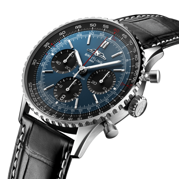Breitling’s iconic pilot’s chronograph – for the journey.
In 1952, Willy Breitling developed a wrist-worn chronograph with a circular slide rule that would allow pilots to perform all necessary flight calculations. Two years later, the Aircraft Owners and Pilots Association (AOPA) announced the design as its official timepiece. The “navigation timer” – or Navitimer – was born.
The AOPA was (and remains) the largest pilots’ club in the world, counting nearly every US aviator among its ranks. As the defacto pilot’s watch throughout the glory days of civil aviation, the Navitimer was worn by airline captains and aircraft enthusiasts. It even made its way into space on the wrist of astronaut Scott Carpenter in 1962. And it wasn’t only pilots drawn to the watch’s irrepressible aesthetic. Celebrities of the day such as Miles Davis and Serge Gainsbourg were devotees, proving that the Navitimer had style as well as function.
There have been many iterations of Breitling’s icon since its debut 70 years ago, but this new Navitimer captures its most classic features, while enhancing them with modern refinements. A flattened slide rule and a domed crystal create the illusion of a sleeker profile. Alternating polished and brushed metal elements give a lustrous, yet understated finish. Most notably, new colors in shades of blue, green and copper, define the updated dial options. And if there is one update sure to spark nostalgia, it’s the return of the AOPA wings to their original position at 12 o’clock.
For 70 years, Breitling’s original pilot’s watch has been beloved by aviators and tastemakers in equal measure. Worn by astronauts in space and the biggest stars on earth, it is Breitling’s most iconic timepiece and one of the most recognizable watches of all time.