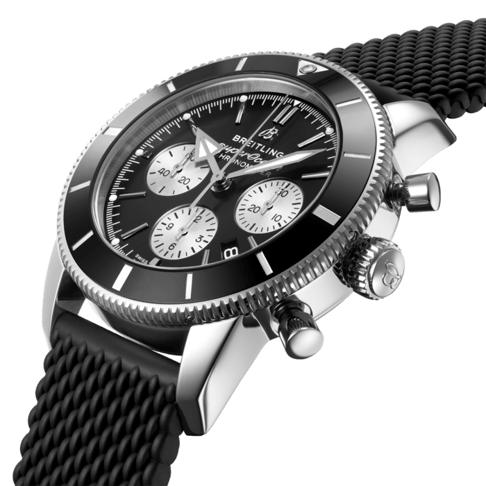 Inspired by the original Superocean from the 1950s, the Superocean Heritage combines iconic design features with a modern touch. Sporty and elegant, the Superocean Heritage is a true embodiment of style at sea.
Featuring the iconic triangular-shaped hands as well as a unidirectional bezel with a polished ceramic ring, the Superocean Heritage is an elegant looking diver’s watch. Available in a variety of materials including stainless steel and 18k red gold, the Superocean Heritage B01 Chronograph 44 features a range of black, blue, silver, or green dials. Offered either with a matching mesh bracelet, or a “mesh-styled” rubber strap fitting a folding buckle, this Superocean Heritage is powered by the in-house Breitling Manufacture Caliber 01, a COSC-certified chronometer.