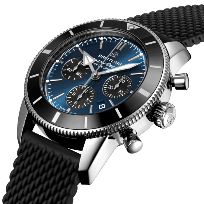 Inspired by the original Superocean from the 1950s, the Superocean Heritage combines iconic design features with a modern touch. Sporty and elegant, the Superocean Heritage is a true embodiment of style at sea.
Featuring the iconic triangular-shaped hands as well as a unidirectional bezel with a polished ceramic ring, the Superocean Heritage is an elegant looking diver’s watch. Available in a variety of materials including stainless steel and 18k red gold, the Superocean Heritage B01 Chronograph 44 features a range of black, blue, silver, or green dials. Offered either with a matching mesh bracelet, or a “mesh-styled” rubber strap fitting a folding buckle, this Superocean Heritage is powered by the in-house Breitling Manufacture Caliber 01, a COSC-certified chronometer.