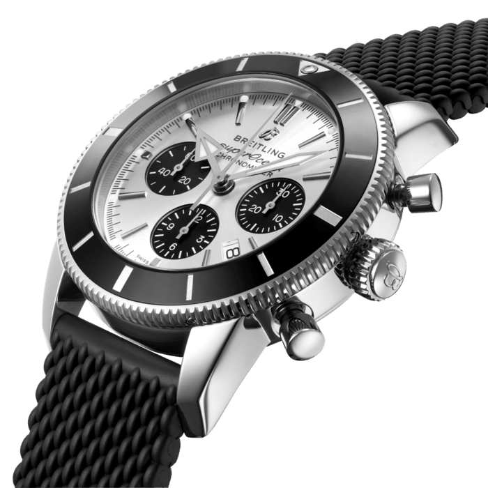 Inspired by the original Superocean from the 1950s, the Superocean Heritage combines iconic design features with a modern touch. Sporty and elegant, the Superocean Heritage is a true embodiment of style at sea.
Featuring the iconic triangular-shaped hands as well as a unidirectional bezel with a polished ceramic ring, the Superocean Heritage is an elegant looking diver’s watch. Available in a variety of materials including stainless steel and 18k red gold, the Superocean Heritage B01 Chronograph 44 features a range of black, blue, silver, or green dials. Offered either with a matching mesh bracelet, or a “mesh-styled” rubber strap fitting a folding buckle, this Superocean Heritage is powered by the in-house Breitling Manufacture Caliber 01, a COSC-certified chronometer.