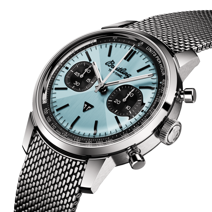 The 1960s was a decade of experimentation, fun, freedom and energy. Whether cruising on a motorcycle or revving up a sportscar, living life at full speed was the order of the day. Willy Breitling felt this change of pace and set out to design an unconventional chronograph that would capture the verve of era. He called it the Top Time.
That spirited tradition continues today with Breitling partnering with some of the coolest names in wheels to create its Top Time designs.
A collaboration with British heritage motorcycle brand Triumph, this watch’s highlight is its ice-blue dial. The distinctive shade was precisely color matched to a Triumph Thunderbird 6T from 1951, and a rare, blue-dialed Breitling Top Time Ref. 815 from the 1970s.
Collectors are sure to pick up on a few other throwbacks to vintage Breitling that include a retro logo, mushroom chronograph pushers and a “Zorro” dial design. The bowtie motif introduced on Top Time in the 1960s (and nicknamed for the wily swashbuckler’s mask) has been subtly integrated using a metal brushing technique that creates a radiant play of light and texture.
The design features a Triumph emblem at 6 o’clock, a speed-measuring tachymeter scale and contrasting “squircle” (not quite square, not quite round) subdials that give the feel of a vintage dashboard gauge. It also comes with a brag-worthy engine under the hood: the exceptional Breitling Manufacture Caliber 01.