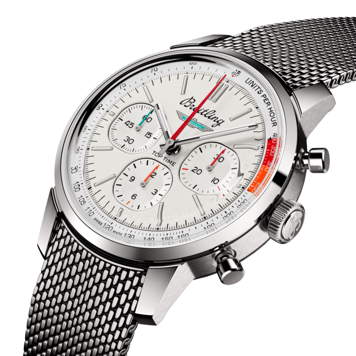 The 1960s was a decade of experimentation, fun, freedom and energy. Whether cruising on a motorcycle or revving up a sportscar, living life at full speed was the order of the day. Willy Breitling felt this change of pace and set out to design an unconventional chronograph that would capture the verve of era. He called it the Top Time.
That spirited tradition continues today with Breitling partnering with some of the coolest names in wheels to create its Top Time designs. The Ford Thunderbird was first unveiled at the 1954 Detroit auto show. It was touted as a fun-to-drive cabriolet that made its presence felt with its luxurious design, solid build and dramatic tailfin.
The Top Time B01 Ford Thunderbird features the colors and emblem of its classic-car counterpart as well as a perforated leather racing strap, speed-measuring tachymeter scale and contrasting “squircle” (not quite square, not quite round) subdials that give the feel of vintage dashboard gauges. It also comes with a brag-worthy engine under the hood: the exceptional Breitling Manufacture Caliber 01.