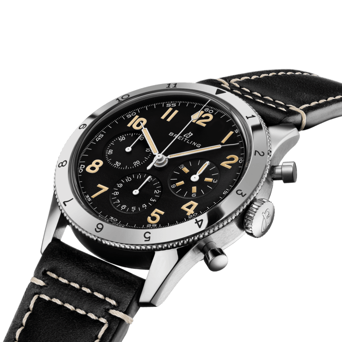 Back in the 1950s, the original Co-Pilot Ref. 765 AVI starred next to another Breitling icon: the Navitimer. With its bold design, engraved rotating bezel and extra legible dial the 765 AVI instantaneously became the perfect companion to the Navitimer as the rugged and reliable pilots’ watch.
Today, the AVI Ref. 765 1953 Re-Edition recreates to the very last detail one of the early executions of the Co-Pilot Ref. 765 AVI.
Its all-black dial, protected by a highly-domed Hesalite crystal, has the same Arabic numerals as the original Co-Pilot from 1953, with tone-on-tone small seconds, 15-minute and 12-hour chronograph counters. The hand-applied Super-LumiNova color has been carefully chosen to recall the original luminescent material and gives the AVI Ref. 765 1953 Re-Edition an additional touch of vintage allure. The 41mm stainless steel case is also identical, and the bezel is secured by three screws that are placed in precisely the same positions as those on the watch from 1953. There are only two concessions to modernity that distinguish this new timepiece from its famous ancestor: the water resistance has been improved up to 3 bar (30 meters) and keen-eyed observers will see that “GENEVE” does not appear on the dial anymore.
The AVI Ref. 765 1953 Re-Edition is powered by the in-house Breitling Manufacture Caliber B09, a hand-wound COSC-certified caliber based on the renowned Breitling Caliber 01 and developed specifically for historical re-editions. It is available on a black vintage-inspired leather strap with a pin buckle as a limited-edition of 1953 pieces, each of which is engraved “ONE OF 1953”.