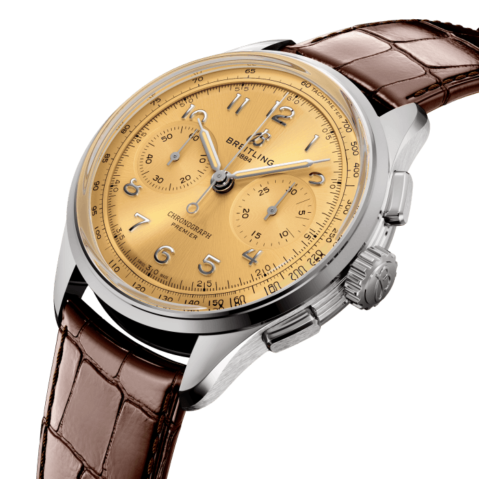 Paying homage to three generations of inventors—Léon, Gaston, and Willy Breitling—the Premier collection embodies Breitling’s legacy as the inventor of the modern chronograph. As Willy Breitling put it, the Premier is the “unmistakable stamp of impeccable taste.”
The modern Premier collection brings this history back to life while showcasing Breitling’s highest level of watchmaking. It comes a range of complications: the Chronograph, the Duograph split-second, the Datora full calendar and the Tourbillon.
The Premier Chronograph’s heritage-revived design features a variety of elegant design details, such as grooves on the case sides, rectangular pushers, applied Arabic numerals and vintage-inspired hands. It also features an open sapphire caseback that beautifully displays the manually wound COSC-certified Breitling Manufacture Caliber B09.