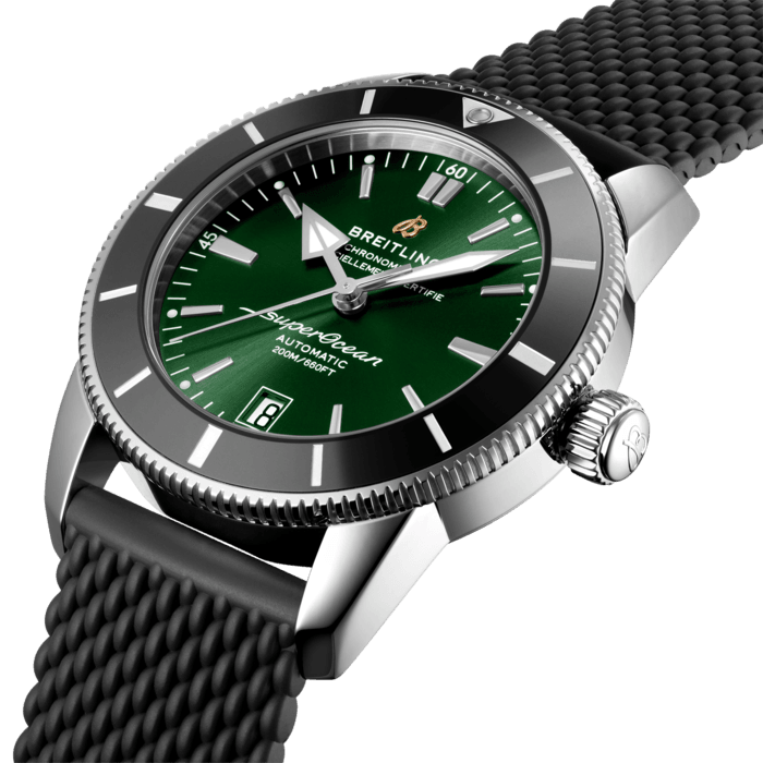 Inspired by the original Superocean from the 1950s, the Superocean Heritage combines iconic design features with a modern touch. Sporty and elegant, the Superocean Heritage is a true embodiment of style at sea.
Featuring the iconic triangular-shaped hands as well as a unidirectional bezel with a polished ceramic ring, the Superocean Heritage is an elegant looking diver’s watch. Available in a variety of sizes and materials including stainless steel and 18k red gold, the Superocean Heritage B20 Automatic features a range of black, blue or green dials. Offered either with a matching mesh bracelet, or a “mesh-styled” rubber strap fitting a folding buckle, this Superocean Heritage is powered by the Breitling Manufacture Caliber B20, a COSC-certified chronometer based on the Tudor Caliber MT5612.