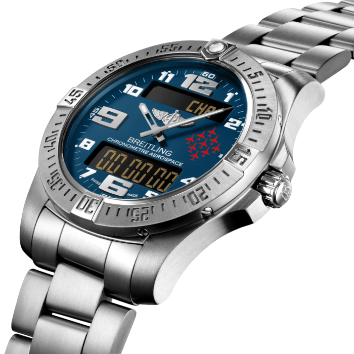 In 1985, Breitling launched the Aerospace, an innovative, multifunctional pilot’s chronograph equipped with state-of-the-art Swiss technology. Heir to this legendary model, the Aerospace Red Arrows retains the same powerful, dynamic and technical style – now in a special-edition tribute to The Royal Air Force Red Arrows Aerobatic Team.
As the only luxury watch brand authorized by the RAF to use the emblems of their celebrated aerobatics team, we are honouring our 30-year relationship with this bold new rendition of the Aerospace, limited to 350 pieces.
Equipped with an official chronometer-certified SuperQuartz™ caliber, the Aerospace is distinguished by a user-friendly control system with crown-activated functions including 1/100th of a second chronograph, countdown timer, second time zone, alarm, audible time signal (minute repeater) and calendar.