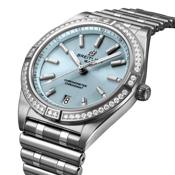 Stylish yet elegant, the modern-retro inspired Chronomat Automatic 36 is the versatile sporty and chic watch for any occasion.
It is available in an array of metal cases, from cool stainless steel, to goes-with-everything bicolor, or even luxurious 18k red gold. Women craving extra sparkle will also be able to opt for diamond-set bezels, indices, and colorful dials. This specific Chronomat Automatic 36 features a stainless steel case with an 18k grey gold gem-set bezel matched to an Ice Blue dial. This Chronomat is powered by the Breitling Caliber 10, a COSC-certified chronometer.