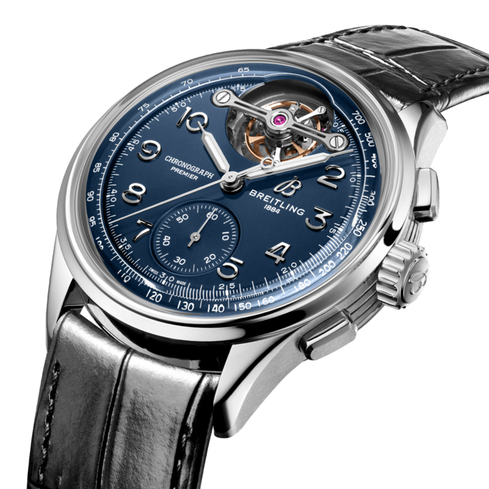 The Premier Tourbillon is a series for people who love the mechanics—and magic—of watchmaking.
Named for each of the Breitling founders, Leon, Gaston and Willy, the three watches feature the stylized square pushers and Arabic numerals that are hallmarks of the Premier line. Their symmetrical dial design, harmonious interplay of numerals and tone-on-tone colorways perfectly balance the undisputed star of the show—the tourbillon—which takes center stage at 12 o’clock. The open sapphire crystal caseback is domed to allow for full appreciation of the B21 movement, whose oscillating weight and tourbillon appear in contrasting 18k gold.
Breitling worked hand-in-hand with the boutique movement maker La Joux-Perret to develop the exquisite B21 movement that takes the uncommon step of combining a tourbillon with a chronograph to make this trio of watches so distinctively Breitling.