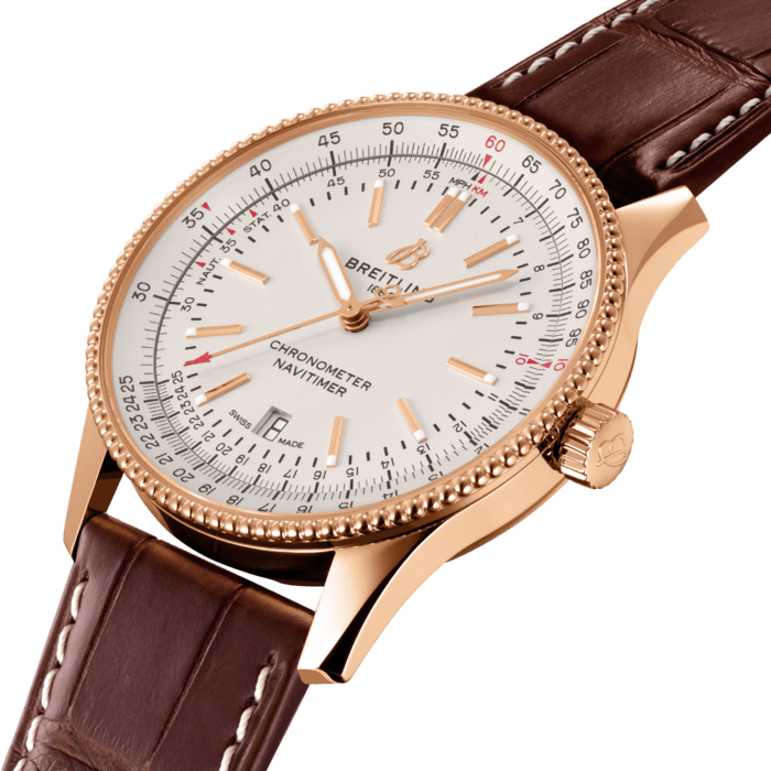 Refined and elegant, the Navitimer Automatic 41 combines the historic appeal of a true icon with the sophistication of a contemporary timepiece.
Available in a variety of materials including stainless steel and 18k red gold, the 41 mm case features a beaded bezel and a range of elegant dial colors. Offered either with a matching bracelet or alligator strap that fits both a stainless-steel pin or folding buckle, the Navitimer Automatic 41 is powered by the Breitling Caliber 17, a COSC-certified chronometer.