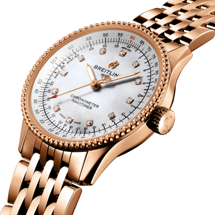 Refined and elegant, the Navitimer Automatic 35 combines the historic appeal of a true icon with the sophistication of a contemporary timepiece.
Available in a variety of materials including stainless steel and 18k red gold, the 35 mm case features a beaded bezel and a range of elegant dial colors, as well as diamond-set white mother of pearl. Offered either with a matching bracelet or alligator strap that fits both a stainless steel pin or folding buckle, the Navitimer Automatic 35 is powered by the Breitling Caliber 17, a COSC-certified chronometer.