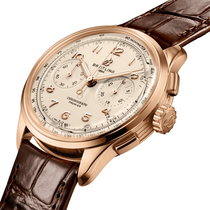 Paying homage to three generations of inventors – Léon, Gaston & Willy Breitling – the Premier Chronograph embodies Breitling’s legacy of inventing the modern Chronograph. As Willy Breitling said, the Premier is an “unmistakable stamp of impeccable taste”.
This latest generation of Premier chronographs brings its timeless elegance back to life, and showcases Breitling’s highest level of watchmaking thanks to a range of iconic Premier complications: the Chronograph, the Duograph and the Datora.
Featuring rectangular chronograph pushers, bi-compax chronograph look and Arabic numerals, the heritage-revived Premier chronographs display a variety of elegant design details such as grooves on the case-sides, open sapphire casebacks and vintage-inspired hands.
The Chronograph comes in two variations: in stainless steel with a pistachio green dial and a gold brown alligator strap or in 18k red gold with a silver dial and a brown alligator strap. The Chronograph is powered by the manually wound cosc-certified Breitling Manufacture Caliber B09.