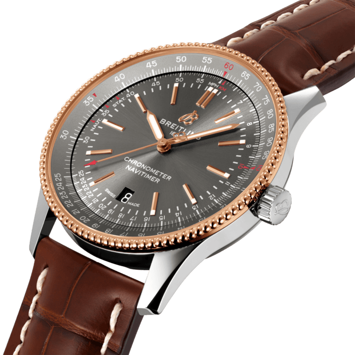 Refined and elegant, the Navitimer Automatic 41 combines the historic appeal of a true icon with the sophistication of a contemporary timepiece.
Available in a variety of materials including stainless steel and 18k red gold, the 41 mm case features a beaded bezel and a range of elegant dial colors. Offered either with a matching bracelet or alligator strap that fits both a stainless-steel pin or folding buckle, the Navitimer Automatic 41 is powered by the Breitling Caliber 17, a COSC-certified chronometer.