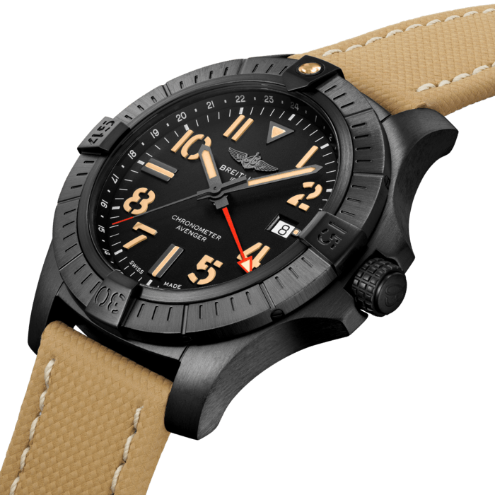 Bold, extremely robust and shock resistant, the Avenger Automatic GMT 45 Night Mission features a lightweight case and an additional red hand indicating a second time zone. As a true Breitling Avenger, it can be used wearing gloves and offers unrivalled safety and reliability to any airborne adventurer. The Night Mission interpretation of the Avenger Automatic GMT 45 features a sturdy 45mm DLC-coated titanium case, black dial and a sand-colored military leather strap that fits either a DLC-coated stainless-steel pin buckle or folding clasp. Its specific Arabic numerals recall the stenciled numbers used on the decks of aircraft carriers. Thanks to its rugged bezel and its special grip-pattern on the crown, the Avenger Automatic GMT 45 Night Mission can be easily operated wearing gloves.