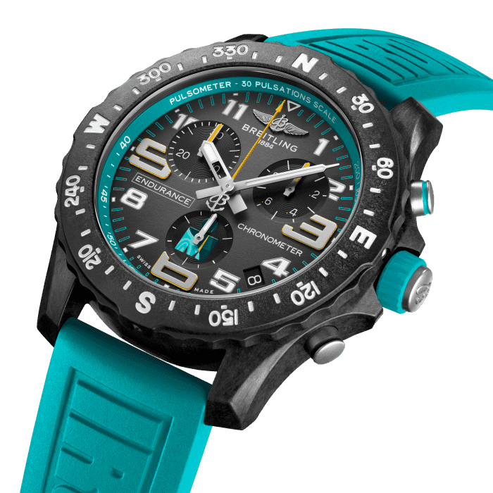 Breitling’s IRONMAN® 70.3 World Championship edition ultra-lightweight Endurance Pro watch.
On your toughest stretches and your steepest climbs, what drives you to push to the finish? You have the mental ammunition to keep you going. Let your Endurance Pro IRONMAN® edition be another tool in your arsenal.
The Endurance Pro was designed for elite triathletes, but works just as well as a stylish sports chronograph for everyday wear. It’s made of Breitlight®, a robust material 3.3 times lighter than titanium and 5.8 times lighter than stainless steel. It’s also thermally stable (with a touch that’s warmer than metal), while being scratch-resistant, non-magnetic and hypo-allergenic.
With its rubber strap and 100m water resistance, the Endurance Pro IRONMAN performs just as well in water as it does on land. And each one is powered by Breitling’s Caliber 82, a COSC-certified SuperQuartz™ movement that provides exceptional accuracy. Combine that with its easy readability, chronograph function and solar compass, and you have a powerful motivator for crossing the finish line.
Limited to just 250 pieces, this unique collectable edition features the distinctive IRONMAN® 70.3 World Championship design and color scheme. Make this performance watch a reward for your achievement or let it be your incentive to conquer the challenge ahead. Either way, it’s a keepsake that will serve as a constant reminder of all that you put in to become an IRONMAN.